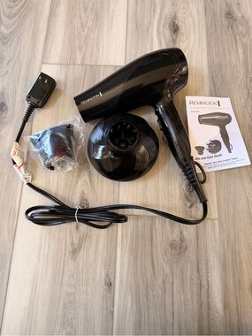 Remington Black Hair Dryer with Diffuser and Nozzle Attachments